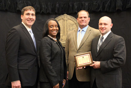 Pictured left to right: Patrick Fleming, Dr. Saundra Williams, Andrew Billingsley, Daniel Boyette